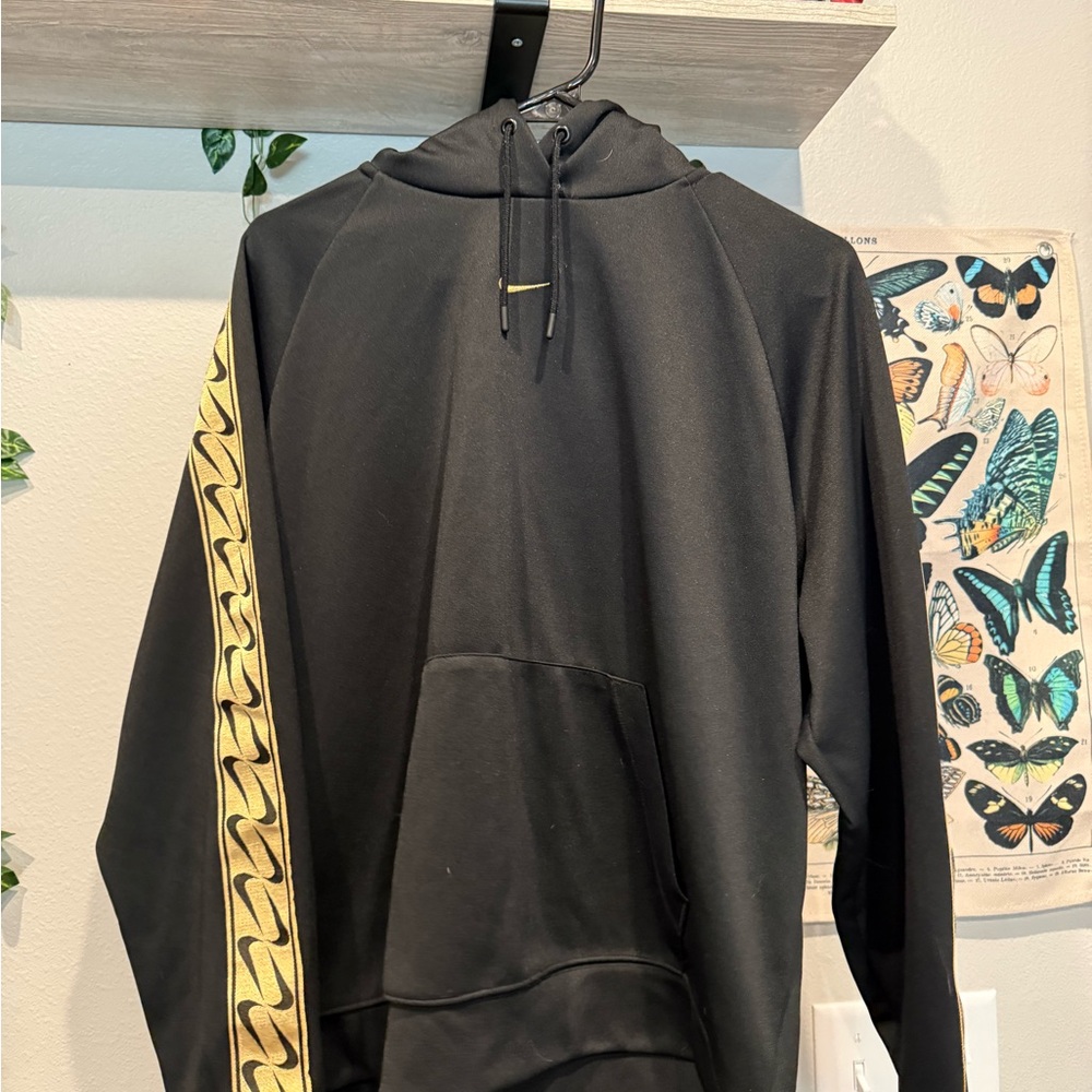 Nike Black Hoodie with Gold Sleeve Accent